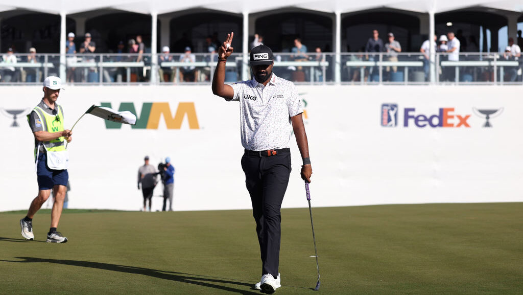 Sahith Theegala of the United States acknowledges the crowd on the 16th green during the second rou...