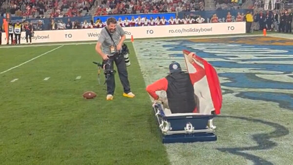 Holiday Bowl casket toss...