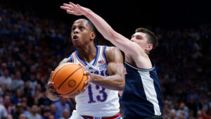 No. 9 Kansas beats top-ranked and previously unbeaten Arizona