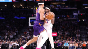 Devin Booker got into it with Joel Embiid for 'flopping'