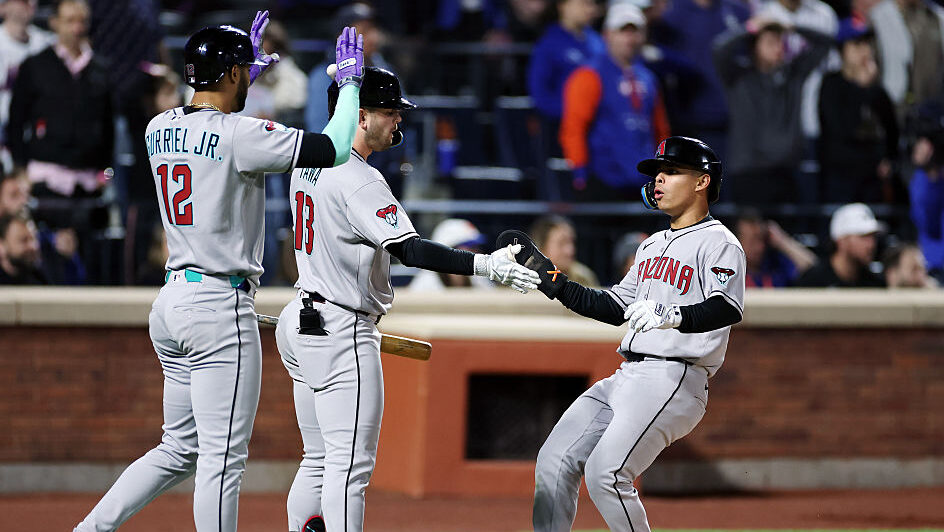 Diamondbacks' Lourdes Gurriel Jr. #12, Tim Tawa #13 and Jorge Barrosa...