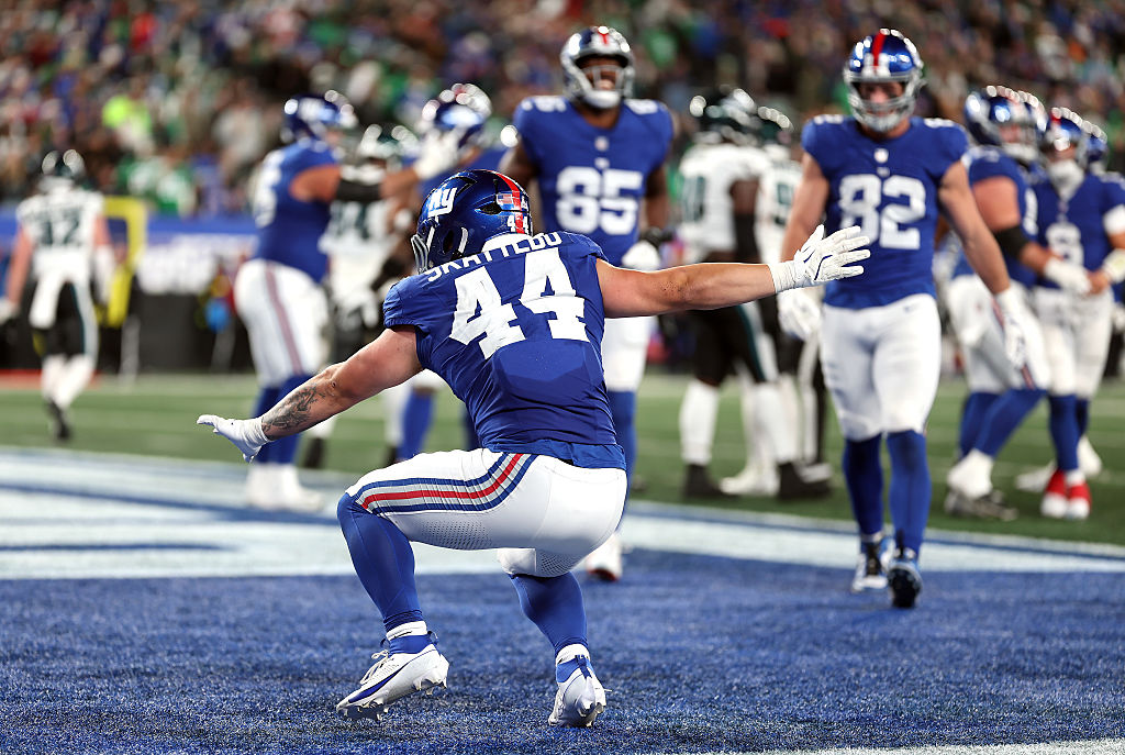 EAST RUTHERFORD, NEW JERSEY - OCTOBER 09: Cam Skattebo #44 of the New York Giants celebrates after ...