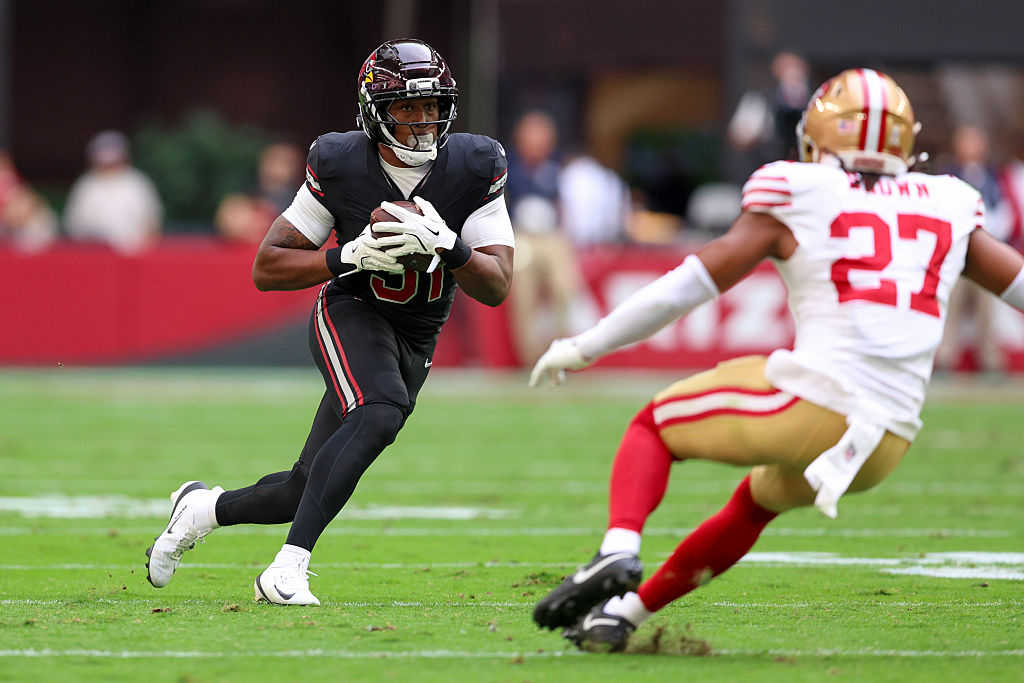 GLENDALE, ARIZONA - NOVEMBER 16: Emari Demercado #31 of the Arizona Cardinals carries the ball afte...