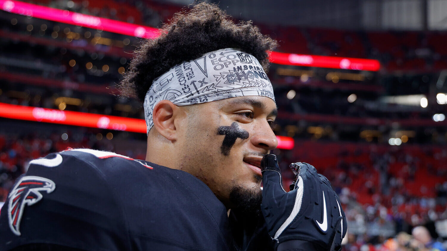 Tyler Allgeier #25 of the Atlanta Falcons looks on after beating the New Orleans Saints 19-17 at Me...