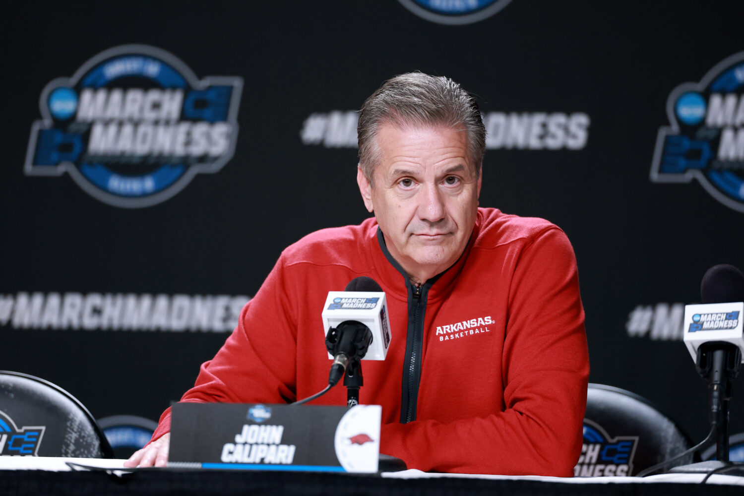 SAN JOSE, CALIFORNIA - MARCH 25: Head coach John Calipari of the Arkansas Razorbacks speaks to the ...
