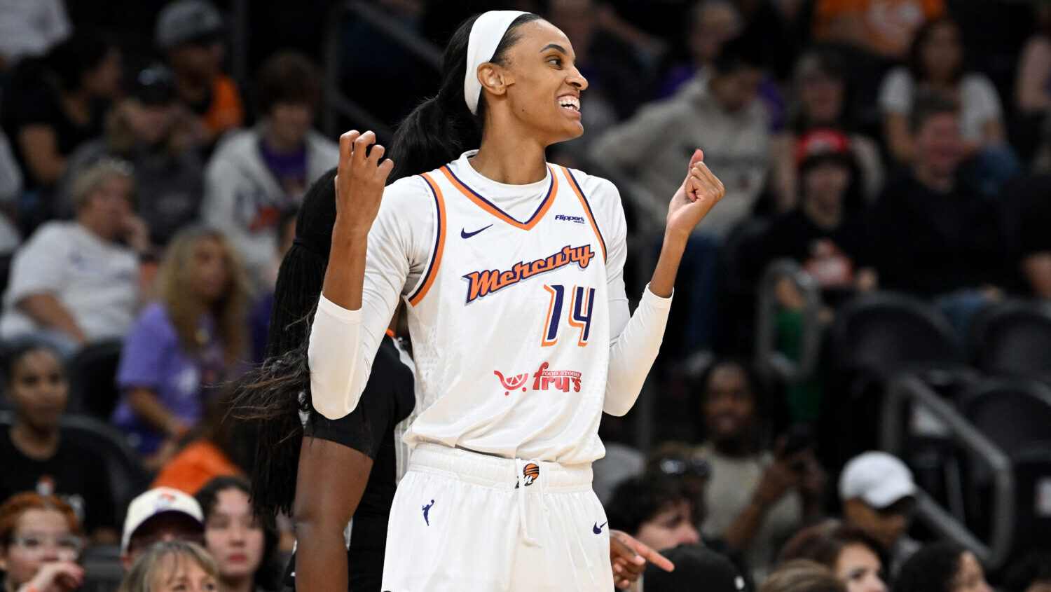 PHOENIX, ARIZONA - AUGUST 05: DeWanna Bonner #14 of the Phoenix Mercury reacts after losing the bal...