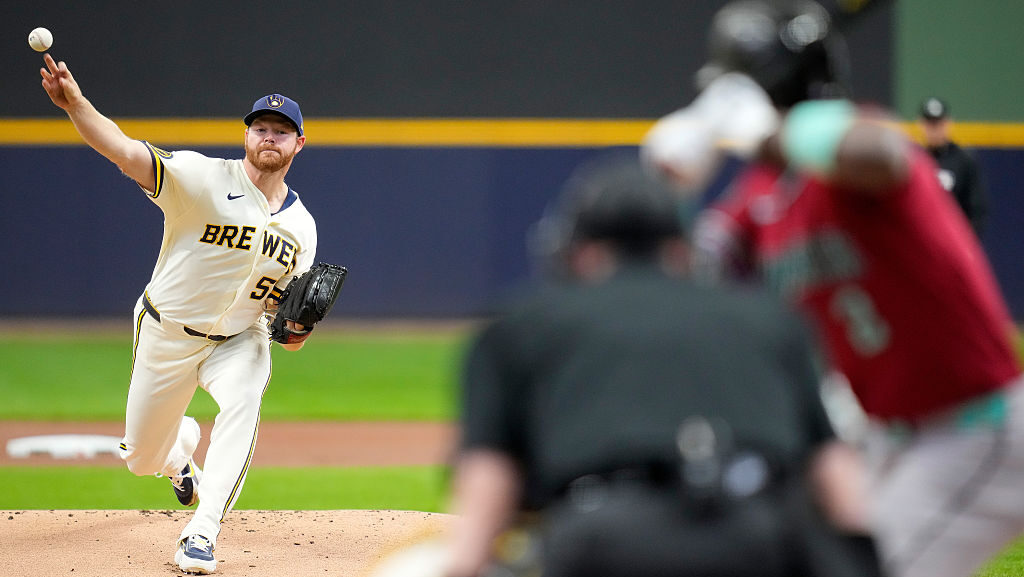 Brandon Woodruff #53 of the Milwaukee Brewers throws a pitch in the first inning against the Arizon...