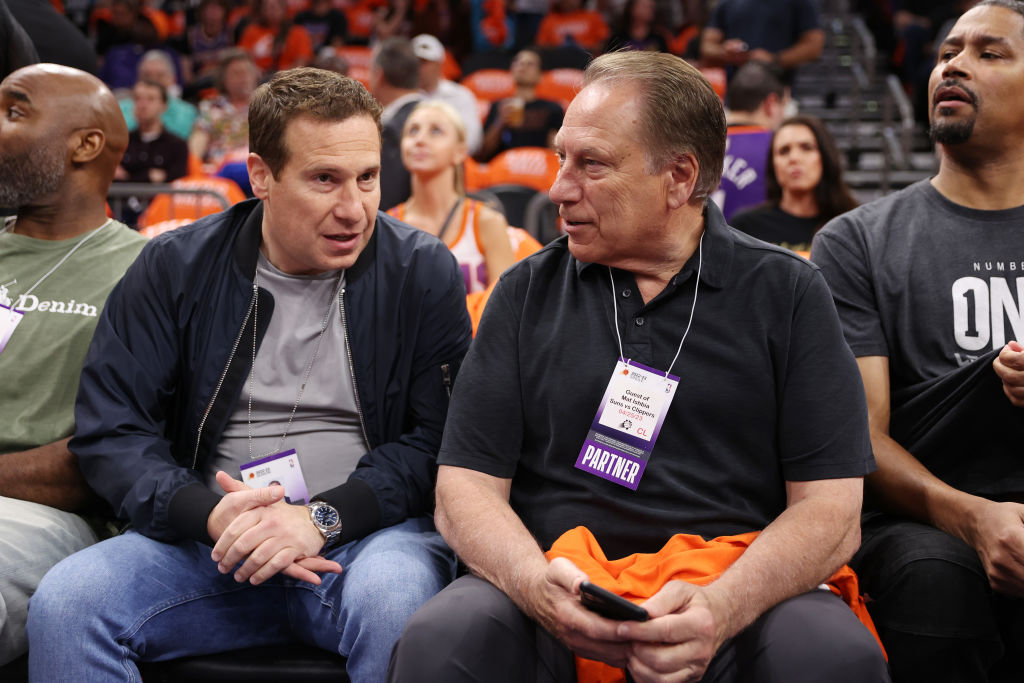 Suns' Mat Ishbia talks with Michigan State's Tom Izzo...