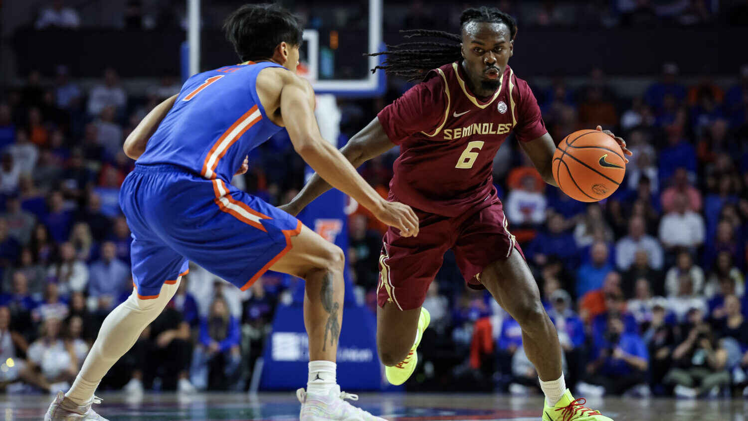 GAINESVILLE, FLORIDA - NOVEMBER 11: Robert McCray V #6 of the Florida State Seminoles dribbles the ...