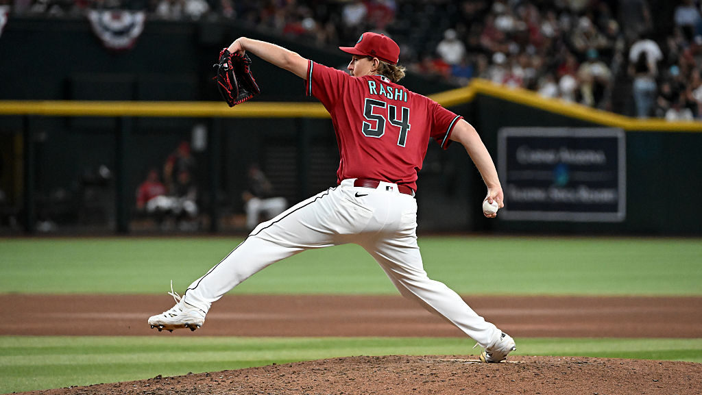 PHOENIX, ARIZONA - APRIL 05: Taylor Rashi #54 of the Arizona Diamondbacks delivers a tenth inning p...