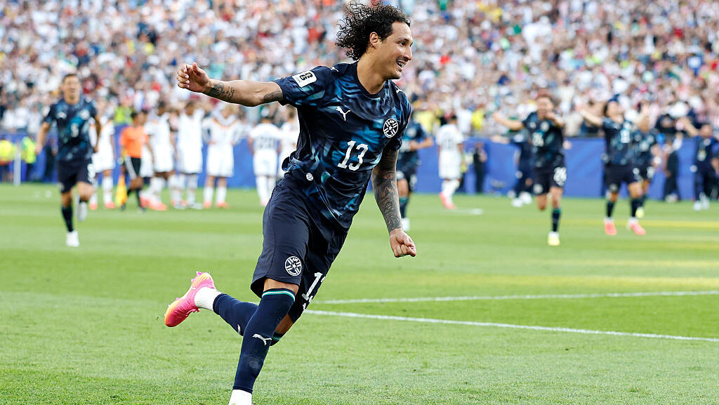 Jose Canale #13 of Paraguay celebrates after scoring the sixth penalty in a penalty shootout for vi...