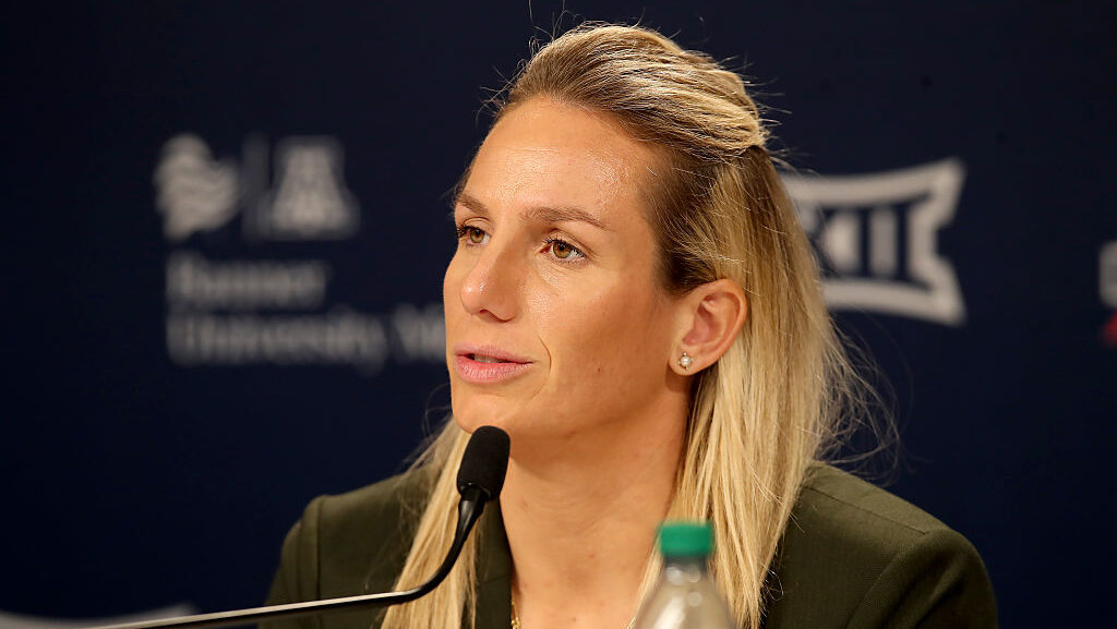 Arizona Wildcats head coach Becky Burke meets with the media after a women's basketball game betwee...