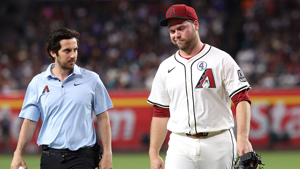 PHOENIX, ARIZONA - JUNE 01: Starting pitcher Corbin Burnes #39 of the Arizona Diamondbacks walks of...