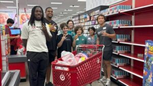 ASU WR Derek Eusebio delivers back-to-school supplies for kids with help from Autism Society