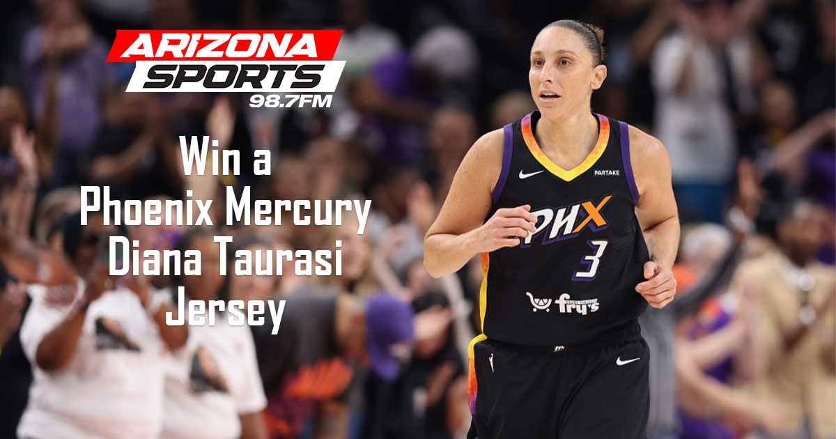 Diana Taurasi wearing her Phoenix Mercury #3 jersey runs up the court with fans cheering in the bac...