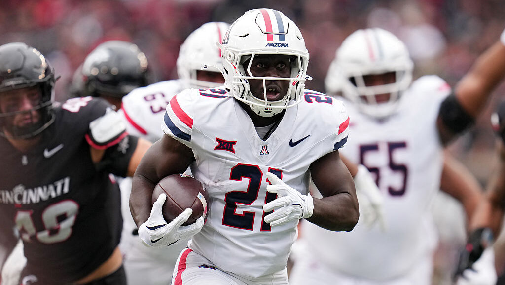 CINCINNATI, OHIO - NOVEMBER 15: Ismail Mahdi #21 of the Arizona Wildcats runs with the ball during ...