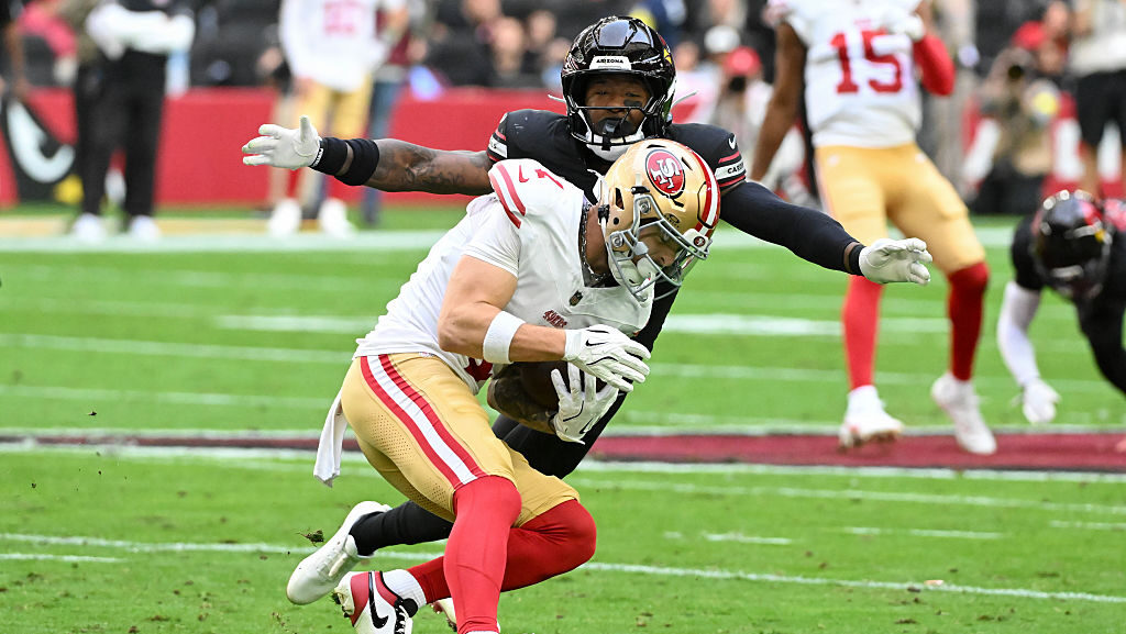 GLENDALE, ARIZONA - NOVEMBER 16: Budda Baker #3 of the Arizona Cardinals tackles Ricky Pearsall #1 ...