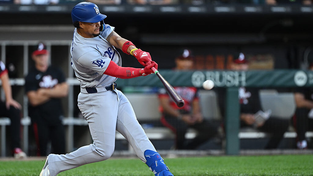 CHICAGO, ILLINOIS - JUNE 12: Santiago Espinal #21 of the Los Angeles Dodgers hits a two run single ...