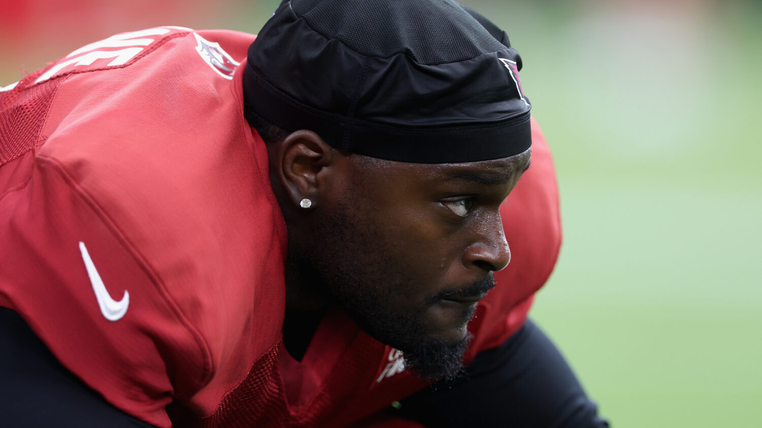 GLENDALE, ARIZONA - JULY 28: Jeremiyah Love #4 of the Arizona Cardinals participates in a team prac...