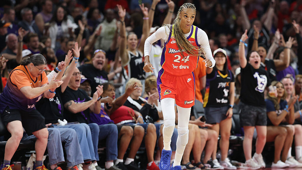 PHOENIX, ARIZONA - AUGUST 16: DeWanna Bonner #24 of the Phoenix Mercury reacts to a three-point sho...