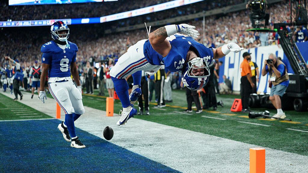 Cam Skattebo backflips following first TD of 2026....
