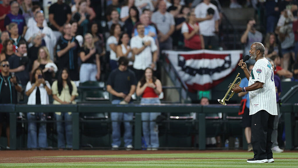 Dr. Jesse McGuire performs national anthem before Arizona Diamondbacks...